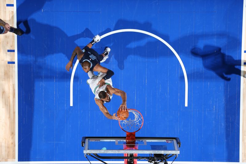 MINNEAPOLIS, MN -  JANUARY 18: Rudy Gobert #27 of the Minnesota Timberwolves dunks the ball during the game against the Memphis Grizzlies on January 18, 2024 at Target Center in Minneapolis, Minnesota. NOTE TO USER: User expressly acknowledges and agrees that, by downloading and or using this Photograph, user is consenting to the terms and conditions of the Getty Images License Agreement. Mandatory Copyright Notice: Copyright 2024 NBAE (Photo by David Sherman/NBAE via Getty Images)