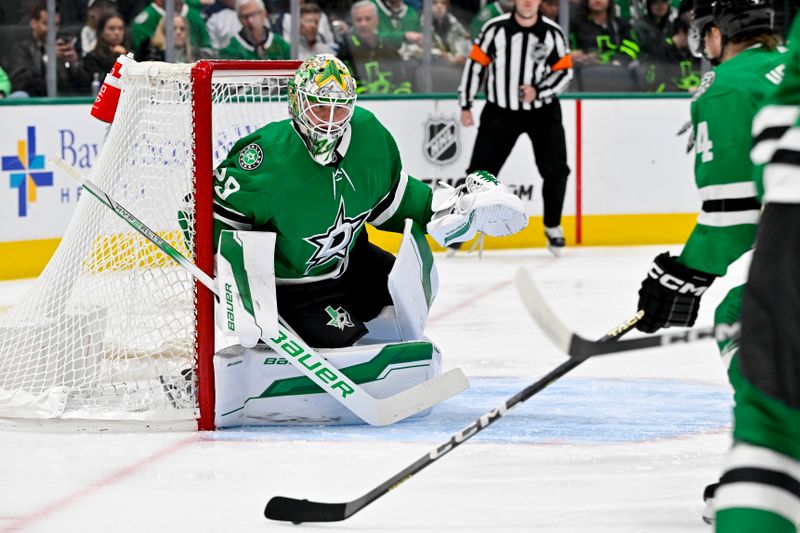 Feb 29, 2024; Dallas, Texas, USA; Dallas Stars goaltender Jake Oettinger (29) faces the Winnipeg Jets attack during the first period at the American Airlines Center. Mandatory Credit: Jerome Miron-USA TODAY Sports