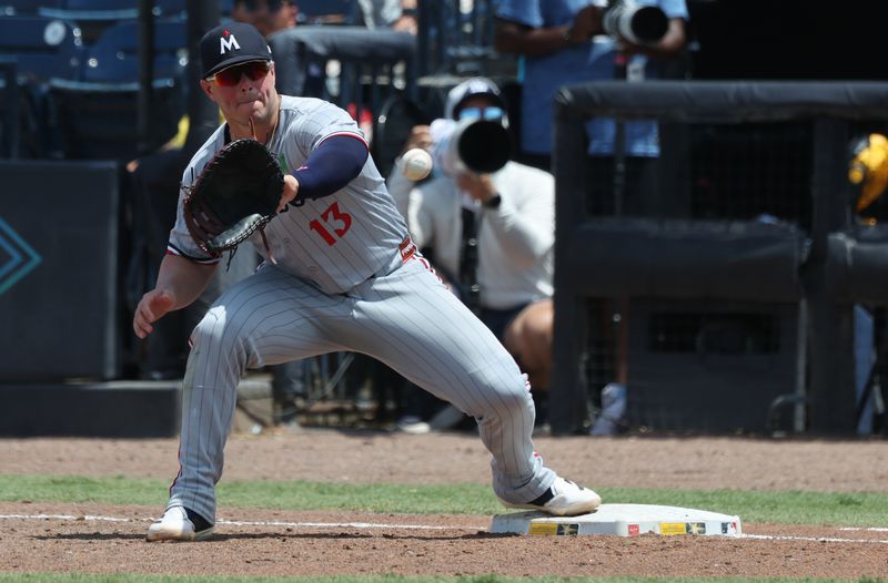 May 28, 2025; Tampa, FL, USA;  Minnesota Twins first base Ty France (13) catches the ball for an out against the Tampa Bay Rays during the sixth inning at George M. Steinbrenner Field. Mandatory Credit: Kim Klement Neitzel-Imagn Images