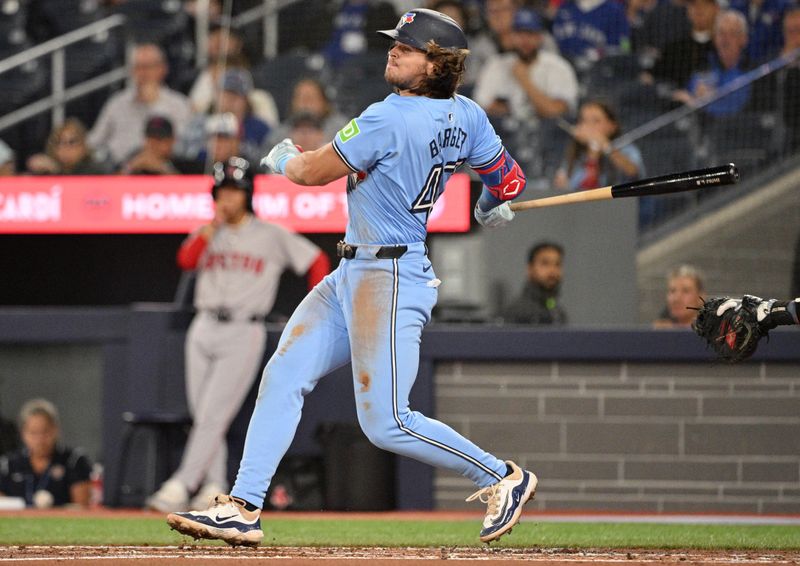 Sep 24, 2024; Toronto, Ontario, CAN; Toronto Blue Jays third baseman Addison Barger (47) hits a single against the Boston Red Sox in the second inning at Rogers Centre. Mandatory Credit: Dan Hamilton-Imagn Images