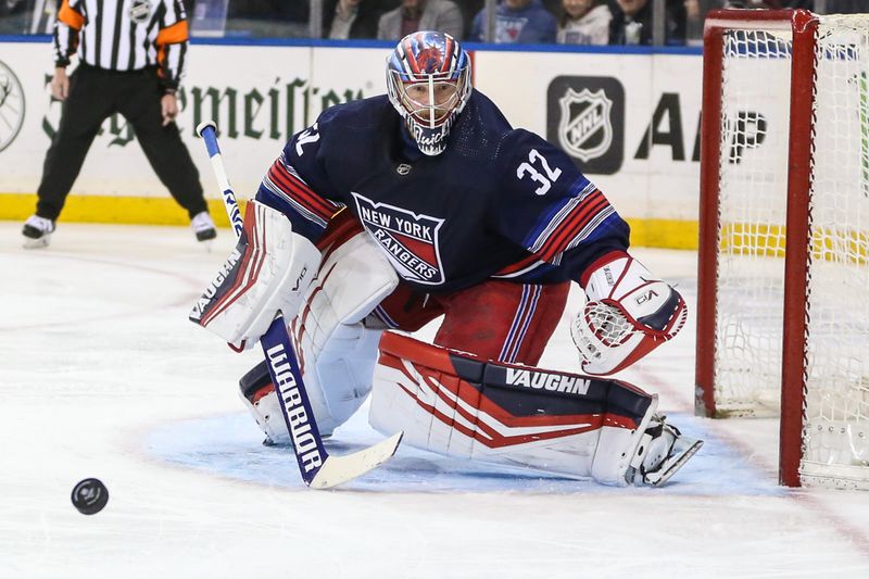 Feb 7, 2024; New York, New York, USA; New York Rangers goaltender Jonathan Quick (32) watches the puck in the third period against the Tampa Bay Lightning at Madison Square Garden. Mandatory Credit: Wendell Cruz-USA TODAY Sports