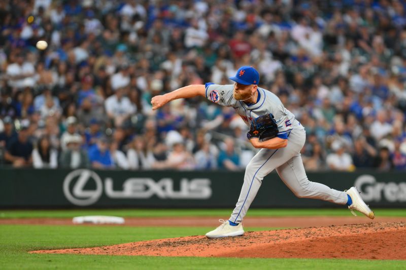 Aug 10, 2024; Seattle, Washington, USA; New York Mets relief pitcher Reed Garrett (75) pitches to the Seattle Mariners during the sixth inning at T-Mobile Park. Mandatory Credit: Steven Bisig-USA TODAY Sports