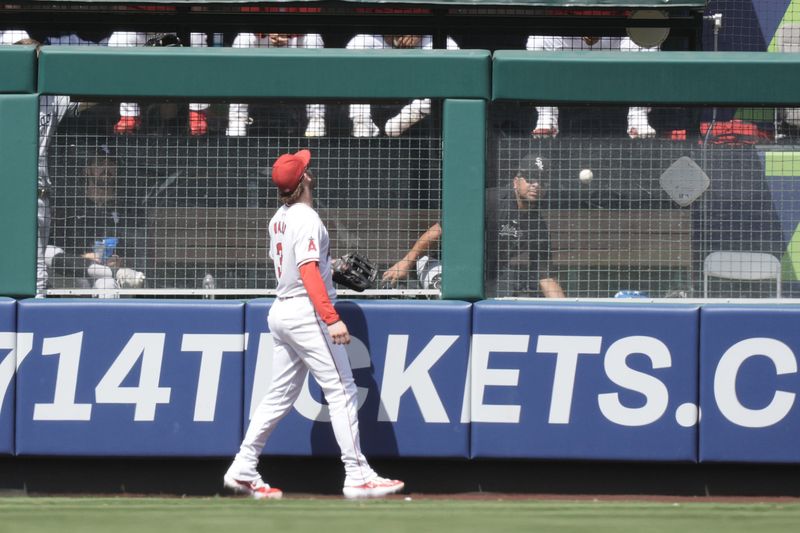 Sep 18, 2024; Anaheim, California, USA; Los Angeles Angels left fielder Taylor Ward (3) watches as a home run hit by Chicago White Sox designated hitter Andrew Vaughn (not pictured) sail over the outfield wall in the fourth inning at Angel Stadium. Mandatory Credit: Kirby Lee-Imagn Images