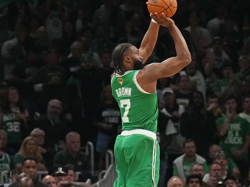 BOSTON, MA - JUNE 17: Jaylen Brown #7 of the Boston Celtics shoots a three point basket during the game against the Dallas Mavericks during Game 5 of the 2024 NBA Finals on June 17, 2024 at the TD Garden in Boston, Massachusetts. NOTE TO USER: User expressly acknowledges and agrees that, by downloading and or using this photograph, User is consenting to the terms and conditions of the Getty Images License Agreement. Mandatory Copyright Notice: Copyright 2024 NBAE  (Photo by Jesse D. Garrabrant/NBAE via Getty Images)