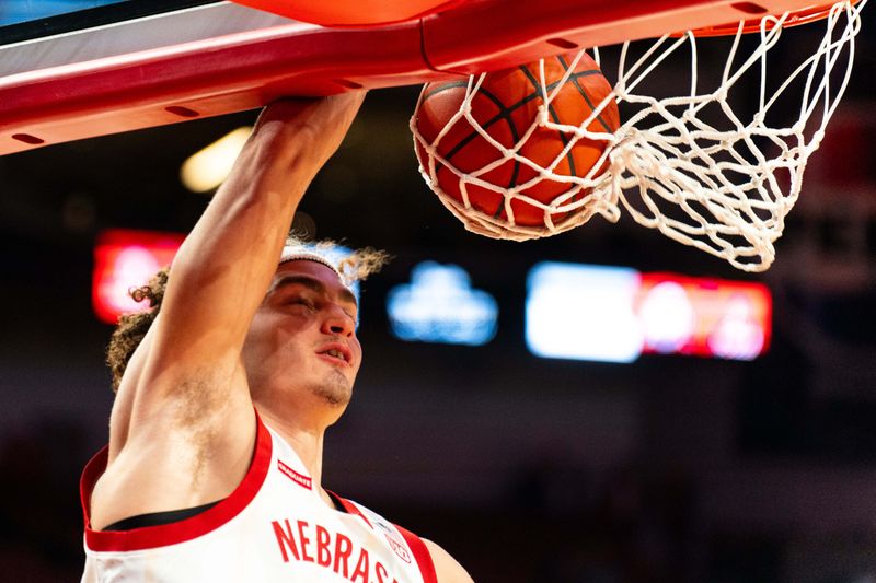 Jan 23, 2024; Lincoln, Nebraska, USA; Nebraska Cornhuskers forward Josiah Allick (53) dunks the ball during warmups before the game against the Ohio State Buckeyes at Pinnacle Bank Arena. Mandatory Credit: Dylan Widger-USA TODAY Sports