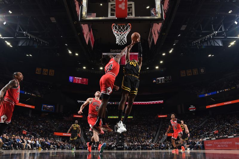 SAN FRANCISCO, CA - MARCH 7: Jonathan Kuminga #00 of the Golden State Warriors drives to the basket during the game against the Chicago Bulls on March 7, 2024 at Chase Center in San Francisco, California. NOTE TO USER: User expressly acknowledges and agrees that, by downloading and or using this photograph, user is consenting to the terms and conditions of Getty Images License Agreement. Mandatory Copyright Notice: Copyright 2024 NBAE (Photo by Noah Graham/NBAE via Getty Images)