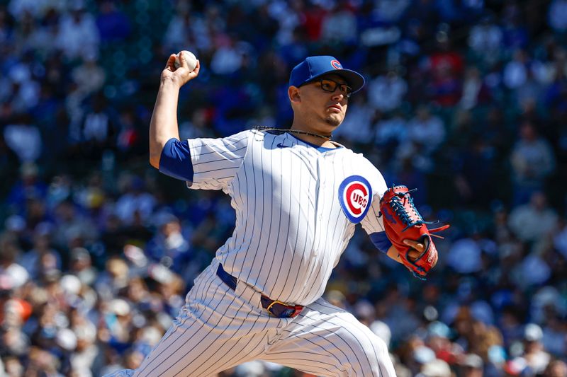 Sep 7, 2024; Chicago, Illinois, USA; Chicago Cubs starting pitcher Javier Assad (72) delivers a pitch against the New York Yankees during the first inning at Wrigley Field. Mandatory Credit: Kamil Krzaczynski-Imagn Images