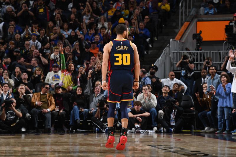 SAN FRANCISCO, CA - JANUARY 29: Stephen Curry #30 of the Golden State Warriors looks on during the game against the Oklahoma City Thunder  on January 29, 2025 at Chase Center in San Francisco, California. NOTE TO USER: User expressly acknowledges and agrees that, by downloading and or using this photograph, user is consenting to the terms and conditions of Getty Images License Agreement. Mandatory Copyright Notice: Copyright 2025 NBAE (Photo by Noah Graham/NBAE via Getty Images)