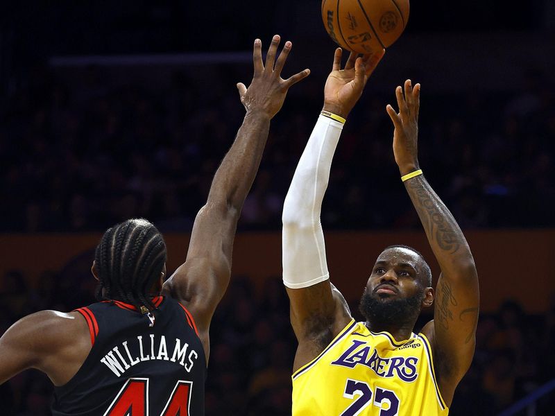 LOS ANGELES, CALIFORNIA - JANUARY 25:  LeBron James #23 of the Los Angeles Lakers takes a shot against Patrick Williams #44 of the Chicago Bulls in the first half at Crypto.com Arena on January 25, 2024 in Los Angeles, California.  NOTE TO USER: User expressly acknowledges and agrees that, by downloading and/or using this photograph, user is consenting to the terms and conditions of the Getty Images License Agreement.  (Photo by Ronald Martinez/Getty Images)