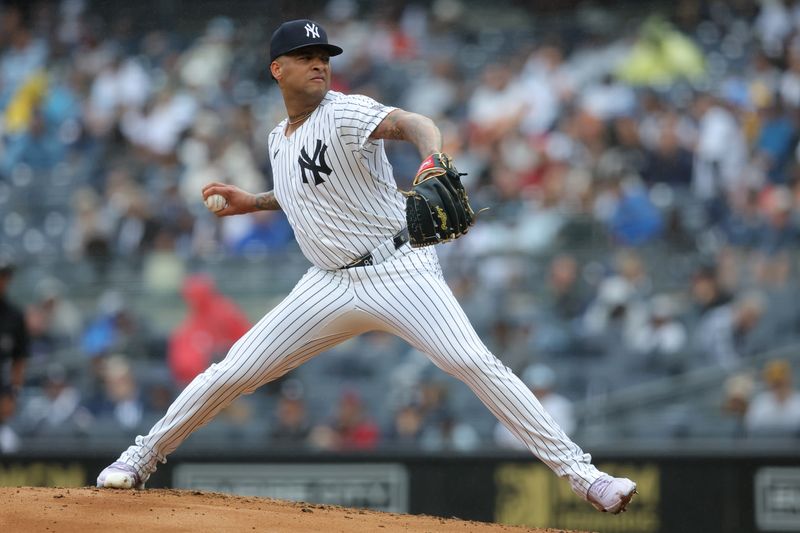 Sep 28, 2024; Bronx, New York, USA; New York Yankees starting pitcher Luis Gil (81) pitches against the Pittsburgh Pirates during the second inning at Yankee Stadium. Mandatory Credit: Brad Penner-Imagn Images