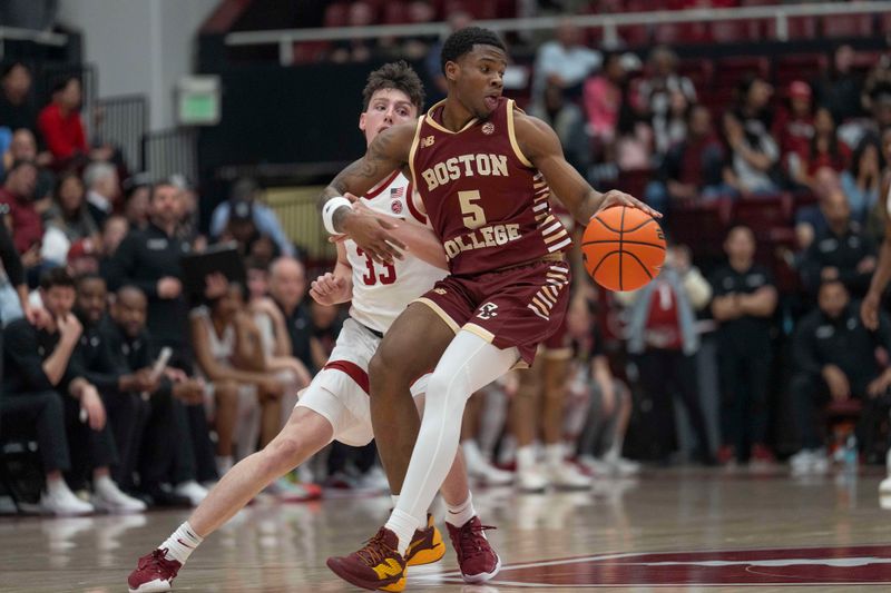 Feb 26, 2025; Stanford, California, USA;  Boston College Eagles guard Fred Payne (5) avoids Stanford Cardinal forward Evan Stinson (33) during the first half at Maples Pavilion. Mandatory Credit: Stan Szeto-Imagn Images