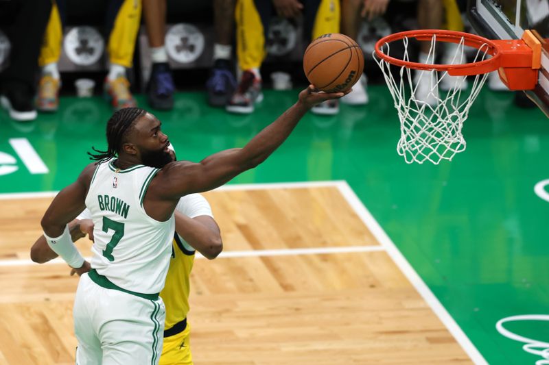 BOSTON, MASSACHUSETTS - MAY 21: Jaylen Brown #7 of the Boston Celtics drives to the basket against Myles Turner #33 of the Indiana Pacers during the second quarter in Game One of the Eastern Conference Finals at TD Garden on May 21, 2024 in Boston, Massachusetts. NOTE TO USER: User expressly acknowledges and agrees that, by downloading and or using this photograph, User is consenting to the terms and conditions of the Getty Images License Agreement. (Photo by Adam Glanzman/Getty Images)