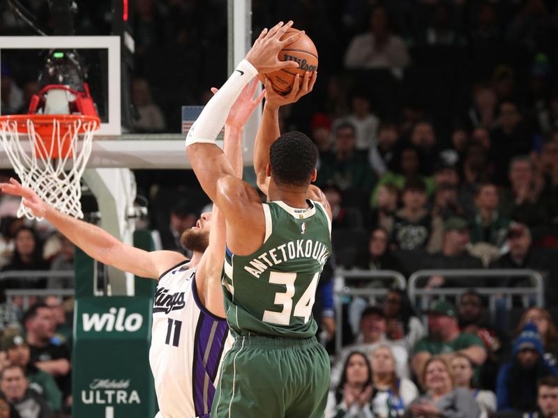 MILWAUKEE, WI - JANUARY 14:  Giannis Antetokounmpo #34 of the Milwaukee Bucks shoots the ball during the game against the Sacramento Kings on January 14, 2025 at Fiserv Forum Center in Milwaukee, Wisconsin. NOTE TO USER: User expressly acknowledges and agrees that, by downloading and or using this Photograph, user is consenting to the terms and conditions of the Getty Images License Agreement. Mandatory Copyright Notice: Copyright 2025 NBAE (Photo by Gary Dineen/NBAE via Getty Images).