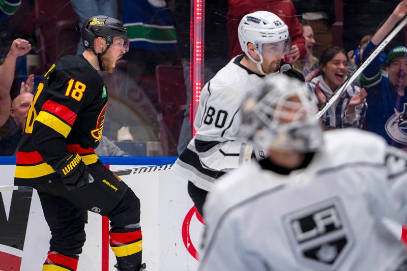 Mar 25, 2024; Vancouver, British Columbia, CAN; Vancouver Canucks forward Sam Lafferty (18) celebrates his goal scored on Los Angeles Kings goalie Cam Talbot (39) in the first period at Rogers Arena. Mandatory Credit: Bob Frid-USA TODAY Sports