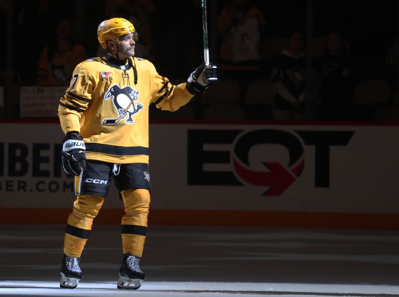 Nov 6, 2025; Pittsburgh, Pennsylvania, USA;  Pittsburgh Penguins right wing Bryan Rust (17) reacts to being named first star of the game after defeating the Washington Capitals at PPG Paints Arena. Mandatory Credit: Charles LeClaire-Imagn Images