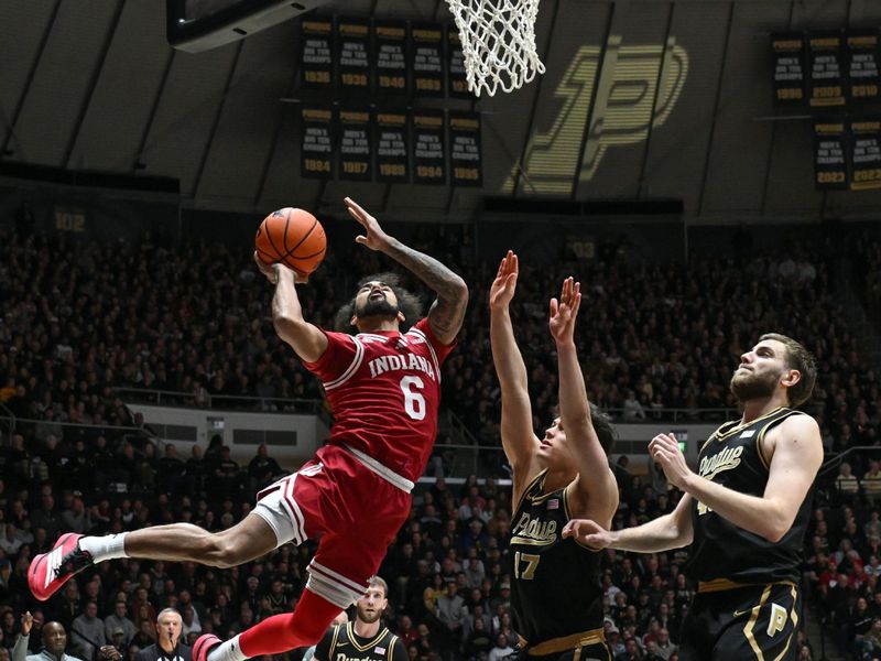 Feb 20, 2026; West Lafayette, Indiana, USA; Indiana Hoosiers guard Tayton Conerway (6) shoots against Purdue Boilermakers guard Omer Mayer (17) during the first half at Mackey Arena. Mandatory Credit: Marc Lebryk-Imagn Images