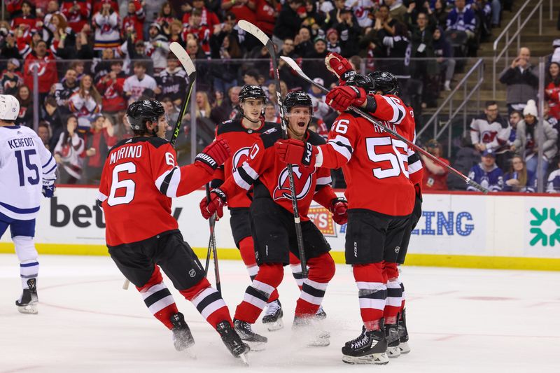 Mar 7, 2023; Newark, New Jersey, USA; New Jersey Devils left wing Erik Haula (56) celebrates his goal against the Toronto Maple Leafs during the second period at Prudential Center. Mandatory Credit: Ed Mulholland-USA TODAY Sports