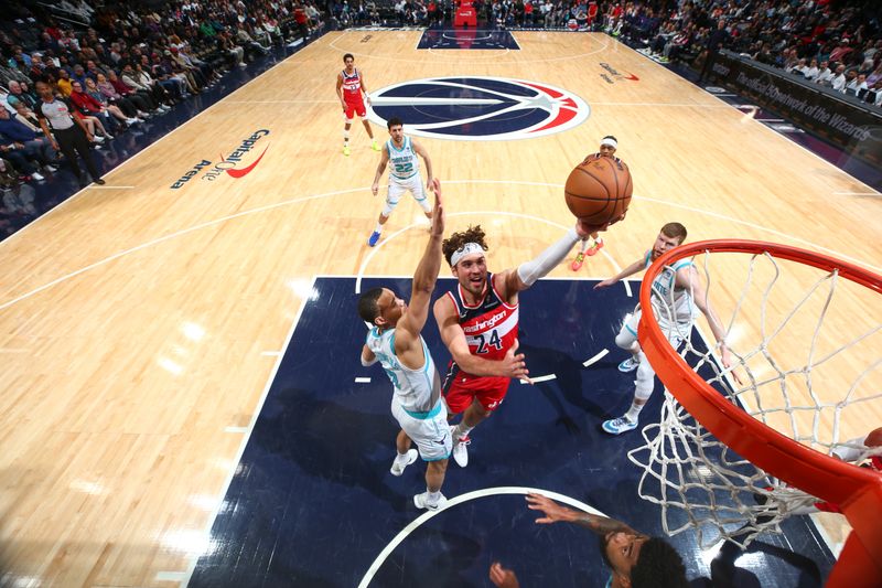 WASHINGTON, DC -? MARCH 8:  Corey Kispert #24 of the Washington Wizards goes to the basket during the game on March 8, 2024 at Capital One Arena in Washington, DC. NOTE TO USER: User expressly acknowledges and agrees that, by downloading and or using this Photograph, user is consenting to the terms and conditions of the Getty Images License Agreement. Mandatory Copyright Notice: Copyright 2024 NBAE (Photo by Stephen Gosling/NBAE via Getty Images)