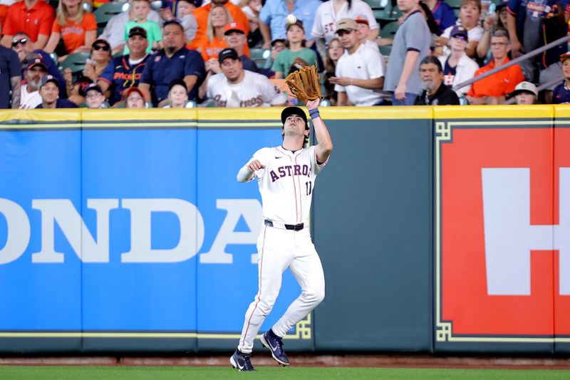 Jun 26, 2024; Houston, Texas, USA; Houston Astros right fielder Joey Loperfido (10) catches a fly ball for an out against the Colorado Rockies during the third inning at Minute Maid Park. Mandatory Credit: Erik Williams-USA TODAY Sports