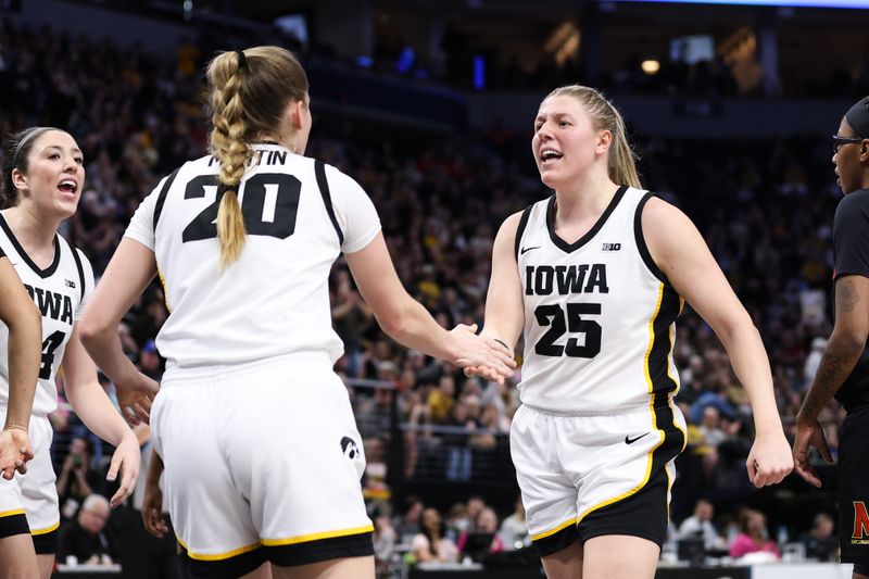 Mar 4, 2023; Minneapolis, MINN, USA; Iowa Hawkeyes forward Monika Czinano (25) reacts to guard Kate Martin's (20) shot against the Maryland Terrapins during the first half at Target Center. Mandatory Credit: Matt Krohn-USA TODAY Sports