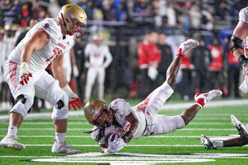 Sep 21, 2024; Chestnut Hill, Massachusetts, USA; Boston College Eagles running back Treshaun Ward (0) dives to the turf with the ball during the first half against the Michigan State Spartans at Alumni Stadium. Mandatory Credit: Eric Canha-Imagn Images