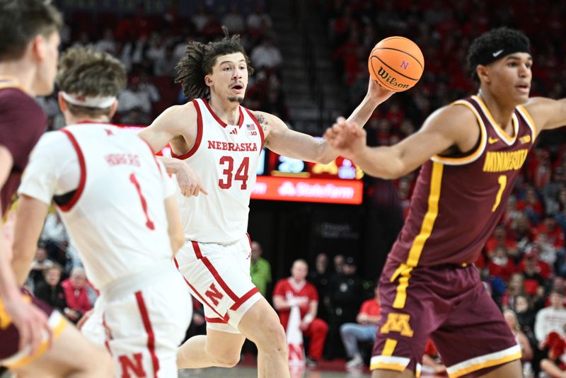 Mar 1, 2025; Lincoln, Nebraska, USA;  Nebraska Cornhuskers center Braxton Meah (34) passes against the Minnesota Golden Gophers during the first half at Pinnacle Bank Arena. Mandatory Credit: Steven Branscombe-Imagn Images