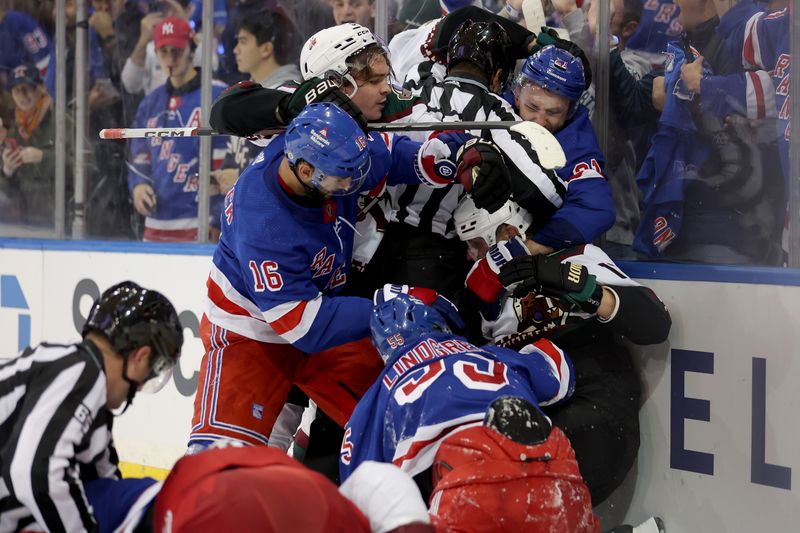 Oct 16, 2023; New York, New York, USA; Arizona Coyotes right wing Clayton Keller (9) and center Nick Schmaltz (8) and center Nick Bjugstad (17) fight with New York Rangers center Vincent Trocheck (16) and center Barclay Goodrow (21) and defenseman Ryan Lindgren (55) after the Rangers defeated the Coyotes 2-1 at Madison Square Garden. Mandatory Credit: Brad Penner-USA TODAY Sports