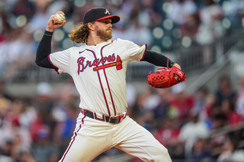 May 20, 2024; Cumberland, Georgia, USA; Atlanta Braves relief pitcher Pierce Johnson (38) pitches against the San Diego Padres during the eighth inning at Truist Park.Mandatory Credit: Dale Zanine-USA TODAY Sports
