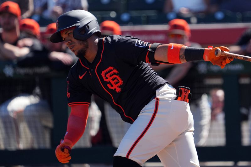 Mar 1, 2024; Scottsdale, Arizona, USA; San Francisco Giants second baseman Thairo Estrada (39) bats against the Texas Rangers during the first inning at Scottsdale Stadium. Mandatory Credit: Joe Camporeale-USA TODAY Sports