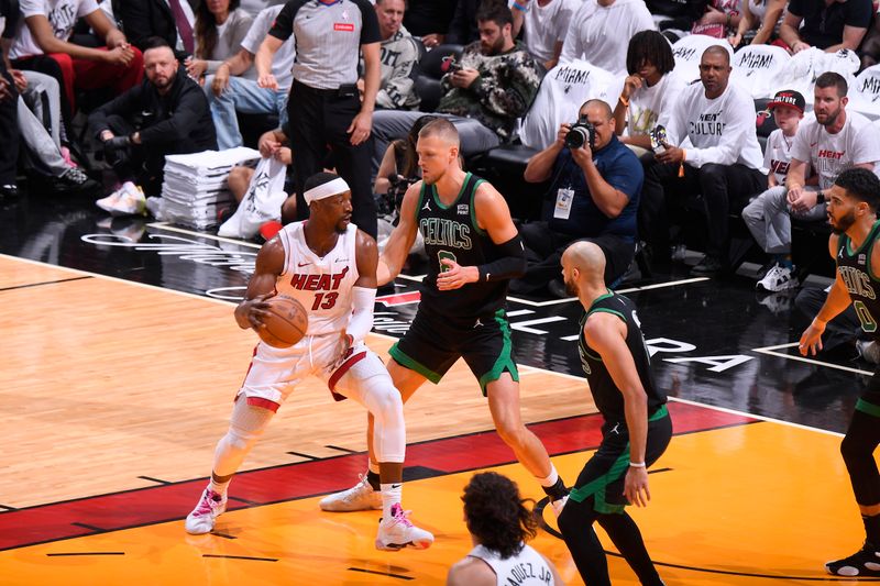 MIAMI, FL - APRIL 27: Bam Adebayo #13 of the Miami Heat dribbles the ball during the game against the Boston Celtics during Round 1 Game 3 of the 2024 NBA Playoffs on April 27, 2024 at Kaseya Center in Miami, Florida. NOTE TO USER: User expressly acknowledges and agrees that, by downloading and or using this Photograph, user is consenting to the terms and conditions of the Getty Images License Agreement. Mandatory Copyright Notice: Copyright 2024 NBAE (Photo by Brian Babineau/NBAE via Getty Images)