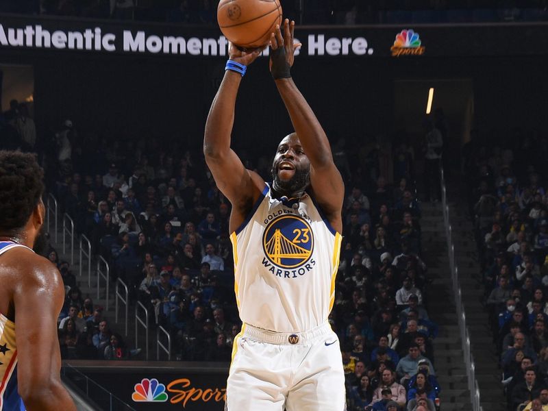 SAN FRANCISCO, CA - MARCH 24: Draymond Green #23 of the Golden State Warriors shoots the ball during the game against the Philadelphia 76ers on March 24, 2023 at Chase Center in San Francisco, California. NOTE TO USER: User expressly acknowledges and agrees that, by downloading and or using this photograph, user is consenting to the terms and conditions of Getty Images License Agreement. Mandatory Copyright Notice: Copyright 2023 NBAE (Photo by Noah Graham/NBAE via Getty Images)