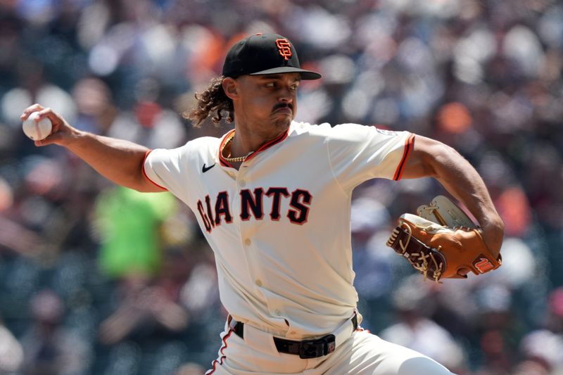 May 3, 2025; San Francisco, California, USA; San Francisco Giants starting pitcher Jordan Hicks (12) throws a pitch against the Colorado Rockies during the first inning at Oracle Park. Mandatory Credit: Darren Yamashita-Imagn Images