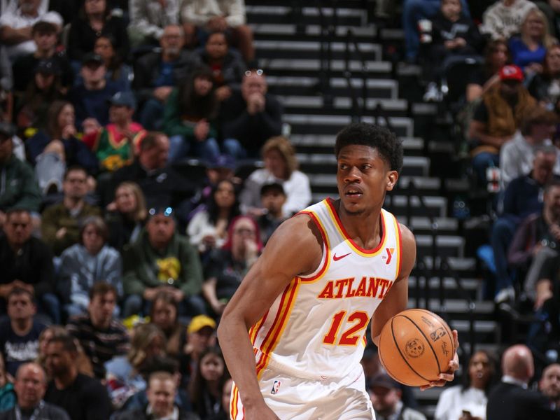 SALT LAKE CITY, UT - MARCH 15:  De'Andre Hunter #12 of the Atlanta Hawks handles the ball during the game  on March 15, 2024 at Delta Center in Salt Lake City, Utah. NOTE TO USER: User expressly acknowledges and agrees that, by downloading and or using this Photograph, User is consenting to the terms and conditions of the Getty Images License Agreement. Mandatory Copyright Notice: Copyright 2024 NBAE (Photo by Melissa Majchrzak/NBAE via Getty Images)