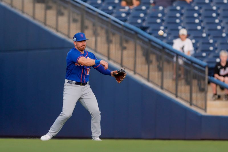 Mar 16, 2023; West Palm Beach, Florida, USA; New York Mets shortstop Danny Mendick (15) throws the baseball to third baseman Mark Vientos (not pictured) to retire Washington Nationals third baseman Ildemaro Vargas (not pictured) during the second inning at The Ballpark of the Palm Beaches. Mandatory Credit: Sam Navarro-USA TODAY Sports