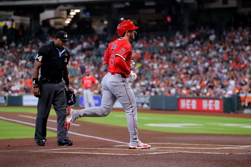 Apr 13, 2025; Houston, Texas, USA; Los Angeles Angels left fielder Taylor Ward (3) crosses home plate after hitting a home run against the Houston Astros during the first inning at Daikin Park. Mandatory Credit: Erik Williams-Imagn Images