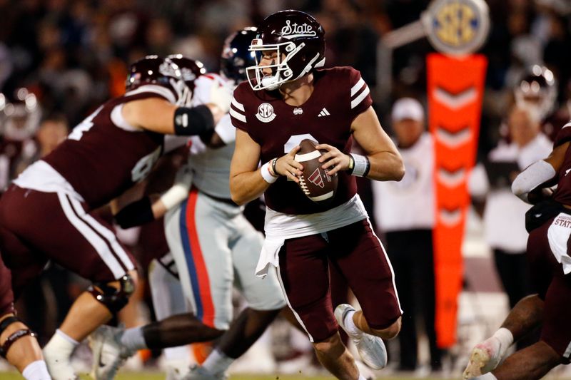 Nov 23, 2023; Starkville, Mississippi, USA; Mississippi State Bulldogs quarterback Will Rogers (2) drops back to pass during the first half against the Mississippi Rebels at Davis Wade Stadium at Scott Field. Mandatory Credit: Petre Thomas-USA TODAY Sports