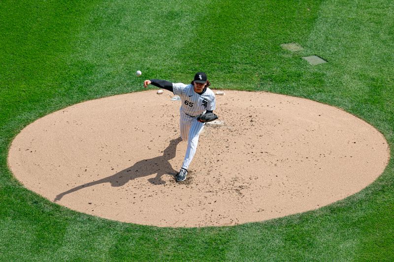 Sep 11, 2024; Chicago, Illinois, USA; Chicago White Sox starting pitcher Davis Martin (65) delivers a pitch against the Cleveland Guardians during the second inning at Guaranteed Rate Field. Mandatory Credit: Kamil Krzaczynski-Imagn Images