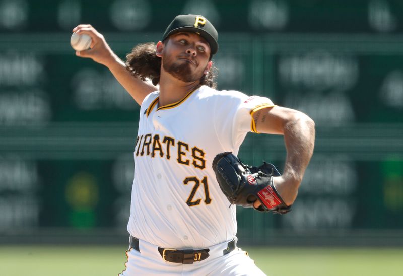 Sep 15, 2024; Pittsburgh, Pennsylvania, USA;  Pittsburgh Pirates starting pitcher Jared Jones (37) delivers a pitch against the Kansas City Royals during the first inning at PNC Park. Mandatory Credit: Charles LeClaire-Imagn Images