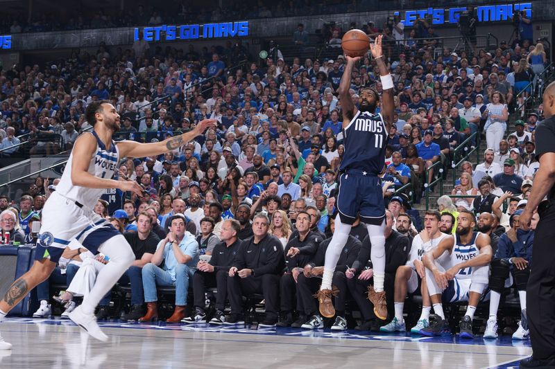 DALLAS, TX - MAY 26: Kyrie Irving #11 of the Dallas Mavericks shoots the ball during the game against the Minnesota Timberwolves during Game 3 of the Western Conference Finals of the 2024 NBA Playoffs on May 26, 2024 at the American Airlines Center in Dallas, Texas. NOTE TO USER: User expressly acknowledges and agrees that, by downloading and or using this photograph, User is consenting to the terms and conditions of the Getty Images License Agreement. Mandatory Copyright Notice: Copyright 2024 NBAE (Photo by David Dow/NBAE via Getty Images)