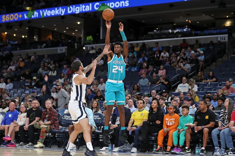 MEMPHIS, TENNESSEE - OCTOBER 10: Brandon Miller #24 of the Charlotte Hornets shoots against John Konchar #46 of the Memphis Grizzlies during the first half at FedExForum on October 10, 2024 in Memphis, Tennessee. NOTE TO USER: User expressly acknowledges and agrees that, by downloading and or using this photograph, User is consenting to the terms and conditions of the Getty Images License Agreement. (Photo by Justin Ford/Getty Images)