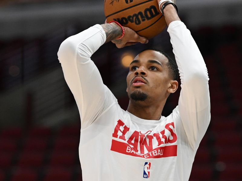 CHICAGO, ILLINOIS - APRIL 04: Dejounte Murray #5 of the Atlanta Hawks warms up before the game against the Chicago Bulls at United Center on April 04, 2023 in Chicago, Illinois. NOTE TO USER: User expressly acknowledges and agrees that, by downloading and or using this photograph, User is consenting to the terms and conditions of the Getty Images License Agreement.  (Photo by Quinn Harris/Getty Images)