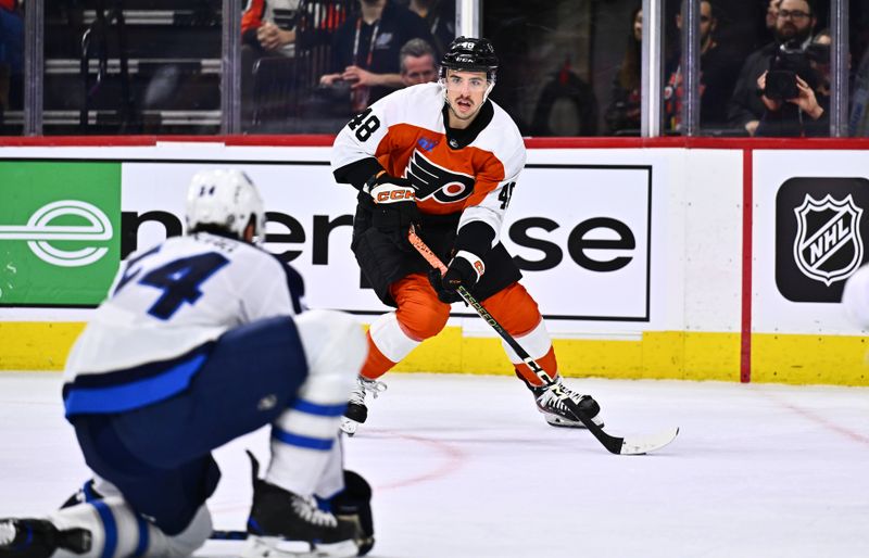 Feb 8, 2024; Philadelphia, Pennsylvania, USA; Philadelphia Flyers center Morgan Frost (48) controls the puck against the Winnipeg Jets in the first period at Wells Fargo Center. Mandatory Credit: Kyle Ross-USA TODAY Sports