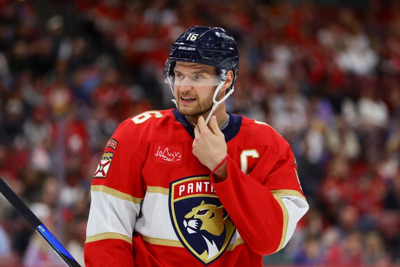 Nov 14, 2024; Sunrise, Florida, USA; Florida Panthers center Aleksander Barkov (16) looks on against the New Jersey Devils during the second period at Amerant Bank Arena. Mandatory Credit: Sam Navarro-Imagn Images