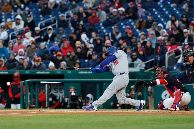 Apr 8, 2025; Washington, District of Columbia, USA; Los Angeles Dodgers catcher Austin Barnes (15) breaks his bat hitting a ground ball against the Washington Nationals during the second inning at Nationals Park. Mandatory Credit: Geoff Burke-Imagn Images