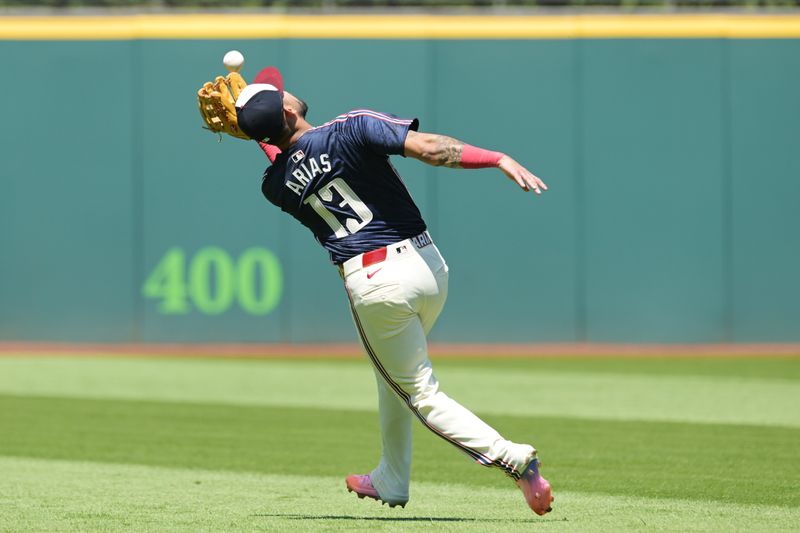 May 19, 2024; Cleveland, Ohio, USA; Cleveland Guardians third baseman Gabriel Arias (13) catches a ball hit by Minnesota Twins designated hitter Trevor Larnach (not pictured) during the third inning at Progressive Field. Mandatory Credit: Ken Blaze-USA TODAY Sports