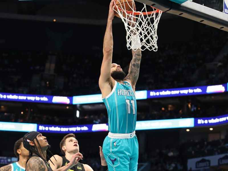 CHARLOTTE, NC - JANUARY 27: Cody Martin #11 of the Charlotte Hornets drives to the basket during the game against the Utah Jazz on January 27, 2024 at Spectrum Center in Charlotte, North Carolina. NOTE TO USER: User expressly acknowledges and agrees that, by downloading and or using this photograph, User is consenting to the terms and conditions of the Getty Images License Agreement.  Mandatory Copyright Notice:  Copyright 2024 NBAE (Photo by Brock Williams-Smith/NBAE via Getty Images)