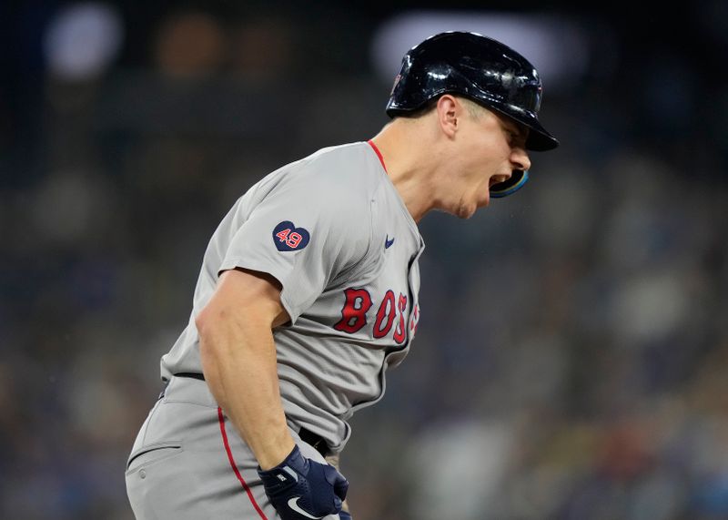 Jun 18, 2024; Toronto, Ontario, CAN; Boston Red Sox left fielder Tyler O'Neill (17) reacts after hitting a solo home run against the Toronto Blue Jays during the eighth inning at Rogers Centre. Mandatory Credit: John E. Sokolowski-USA TODAY Sports