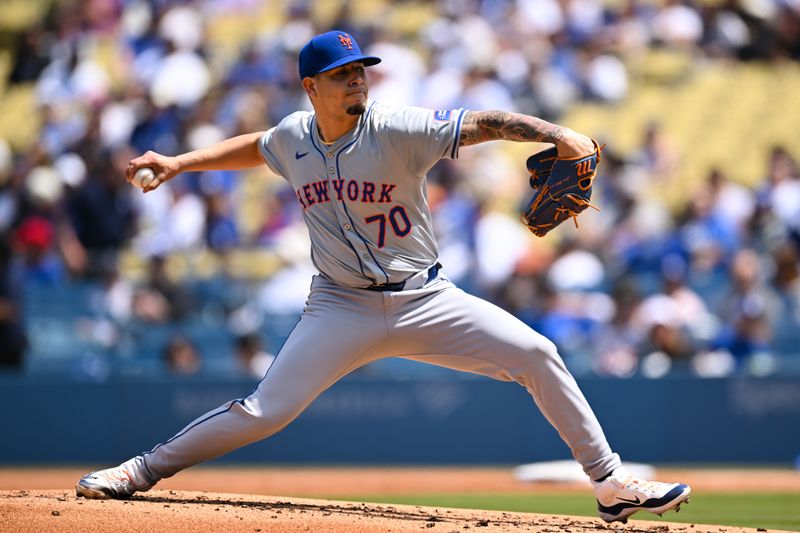 Apr 20, 2024; Los Angeles, California, USA; New York Mets pitcher José Buttó (70) throws a pitch against the Los Angeles Dodgers during the first inning at Dodger Stadium. Mandatory Credit: Jonathan Hui-USA TODAY Sports