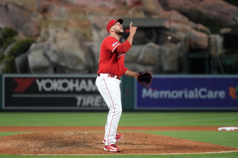 Jul 18, 2023; Anaheim, California, USA; Los Angeles Angels relief pitcher Carlos Estevez (53) celebrates after the game against the New York Yankees at Angel Stadium. Mandatory Credit: Kirby Lee-USA TODAY Sports