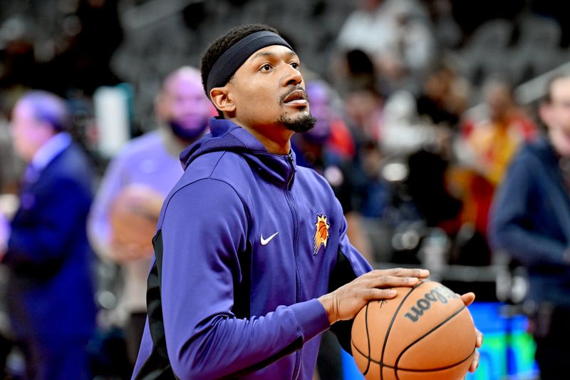 ATLANTA, GEORGIA - FEBRUARY 02: Bradley Beal #3 of the Phoenix Suns warms up before the game against the Atlanta Hawks at State Farm Arena on February 02, 2024 in Atlanta, Georgia. NOTE TO USER: User expressly acknowledges and agrees that, by downloading and/or using this photograph, user is consenting to the terms and conditions of the Getty Images License Agreement.  (Photo by Paras Griffin/Getty Images)